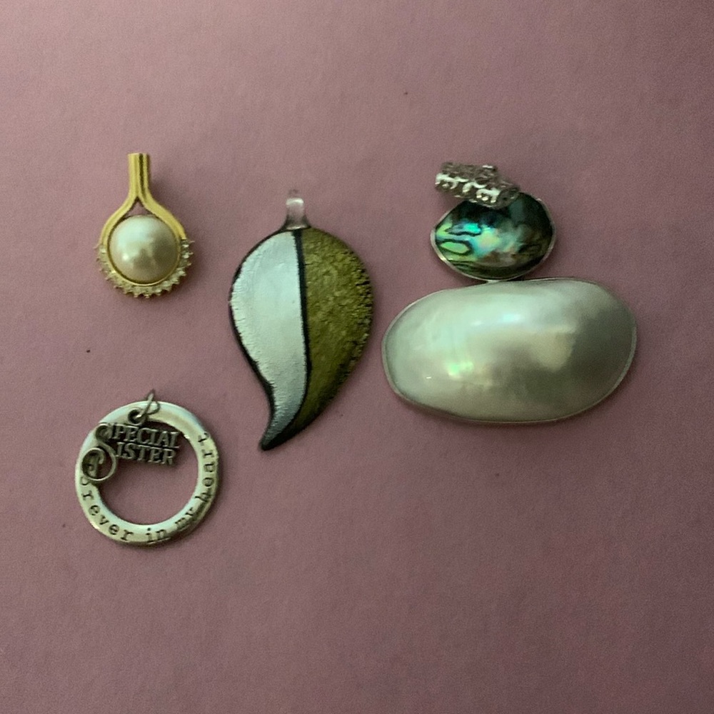 Four beautiful pendants, nice selection